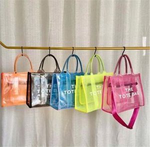 Kvällspåsar kvinnors väska 2022 Ny sommartrend PVC Mesh Tote Bag Fashion Mortile Transparent Letter Handbag283i