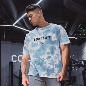 Camisetas de fitness de fitness de verão de manga curta masculino de camuflagem de algodão esportes soltos de tamanho grande de gente