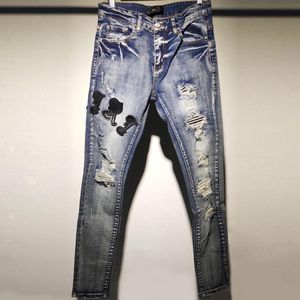 Мужские джинсы разорванные для мужчин кожаные буквы лоскутное бренд колготки мотоциклетные брюки Homme Marque de Luxe Hole Blue