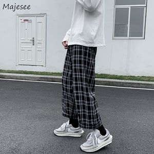 Calça casual homens homens harajuku streetwear modeia coreana estilo xadrez tornozelo de tornozelo de cintura elástica calça as calças de calça retro 220719