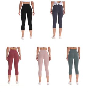 Womens Yoga Capris Leggings Sports Slim Short Legging Running Litness Women في الهواء الطلق الصلبة الصلبة السراويل المطوية C2911