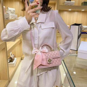 55% rabatt på onlineförsäljning grossisthandväska en axel mjuk läder sommar präglad rosa liten fyrkantig bärbar kvinna