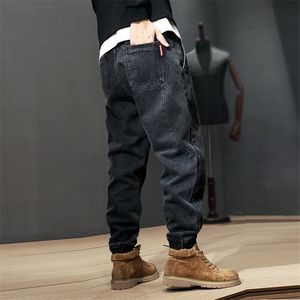 Masowe streetwear Mężczyźni dżinsy luźne fit splatane projektant harem dżinsy męskie spodnie towarowe japoński styl hip -hop joggers dżinsy homme t200614