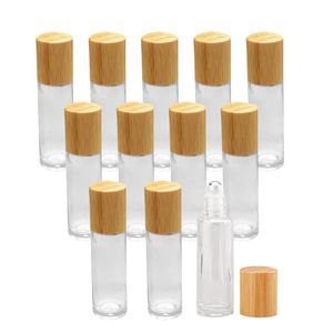 Garrafas de rolos de vidro claras claras de 5ml 10ml com frascos essenciais do óleo de esferas do metal com tampa de grão de madeira