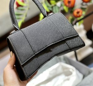 Den senaste versionen av Hourglass Women's Portable Shoulder Bag First Layer Cow Leather High-End Luxury Simple Shiny Matching Folding Present Box
