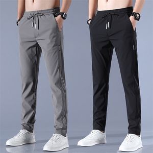 Mens Ice Silk Trousers Solid Color MidWaist Loose Breathable StraightLeg Casual Pants Thin QuickDrying Sports 220628