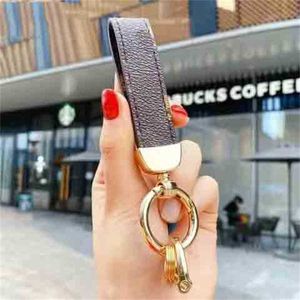 Classic Brown Pu Leather Keychains Nyckelkedjan Key Ring Holder Keychain för män Kvinnor