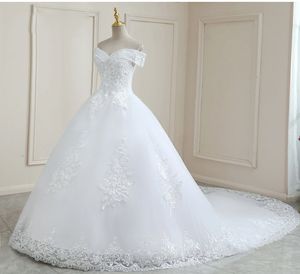 Hochzeitskleider applizierte Spitzenknopfstufte Rüschen zurück Brautkleider Vestidos de Novia Robe de Mariage