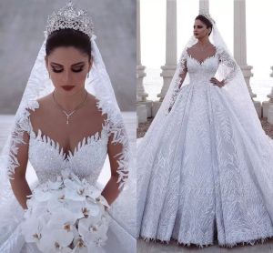 2018 Designer Bridal Gowns Long Sleeves V Neck Heavily Embellished Lace Embroidered Romantic Princess Blush A Line Beach Bridal Gowns