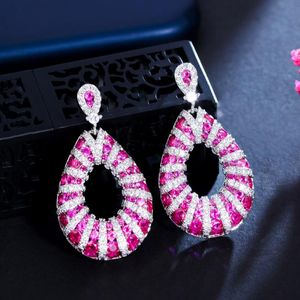 Baumelnde Kronleuchter CWWZircons Schwere Steinarbeit Micro Pave Fuchsia Rot Zirkonia Tropfen Hochzeit Ohrringe Für Frauen Festlicher Schmuck CZ157D