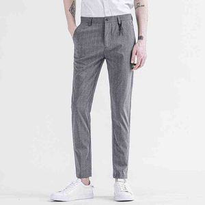 Pantaloni da completo estivi Uomo Nero Grigio Pantaloni formali da ufficio piatti Smart Business Pantaloni eleganti da uomo ufficiali per abbigliamento da uomo 2022 L220706