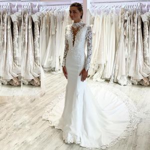 2022 Abiti da sposa sexy a sirena africana araba Abiti da sposa Plus Size Collo alto Illusion Appliques in pizzo Perline di cristallo Fiori floreali 3D Maniche lunghe