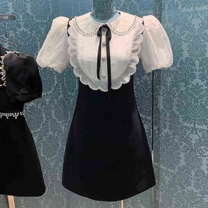 high quality dress summer new style bubble sleeve skirt baby collar Beaded diamond bow waist