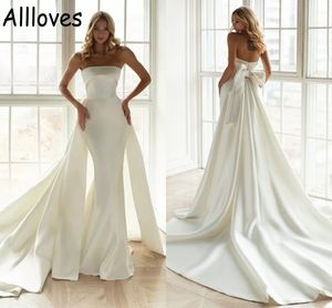 Enkel satin sjöjungfrun bröllopsklänningar med löstagbar kjol axelfri rygglös boho trädgård brudklänningar bow bow overts mode robes de mariée cl0290