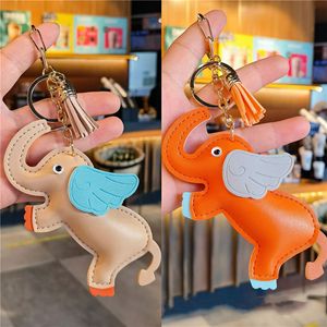 Dumbo Pendant Key Rings Chains Car Keyring Holder PU Leather Animal Bag Keychains Accessories Fashion Elephant Design Keyring Charms for Men Women Couples Gifts