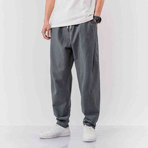 2022 Męskie sprężyste spodnie haremowe moda męska hip hop joggery uliczne szerokie nogi spodnie Mężczyźni Czysty kolor bawełniany spodnie L220706