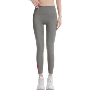 Mulheres leggings meias de ioga calças finas Lady Skinny Trose Outwears Aluta Cantura Esporte Capris Designer Legging S-2xl