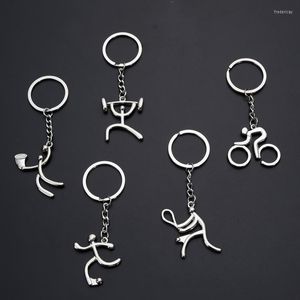 Keychains Sporty Man Bicycle Figure Keychain Football Tennis Keyring Souvenirs Creative For Bike Cycling Lover Sport Logo Key Chain Fred22
