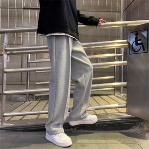 Spodnie dresowe Mężczyźni Proste Spodnie Harem Mężczyzna Koreański Człowiek Luźne Dorywcze Jesień Streetwear CN (pochodzenie) Pełna długość Four Seasons 220325