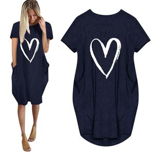 Plus Size Klänningar Lösa T-shirt Toppar Klänning Kvinnor Lady Sommar O Neck Kortärmad Pocket Vestido 5XL MIDI SUNDRESS A20