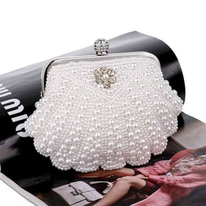 Bolsas luxuosas para noite, nova moda, design de concha, feminina, com contas, diamantes artesanais, bolsa mensageiro de ombro, bolsa de casamento de cristal 230808