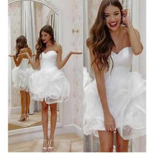 Abiti da sposa Abiti da sposa corti da spiaggia estivi senza spalline sexy con volant di fiori 3D bianchi avorio con lacci sul retro