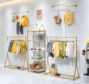 Barnklädbutik Display Hylla kommersiella möbler golvtyp gyllene hyllor baby klädhängare klädbutik rack barn tyg rack