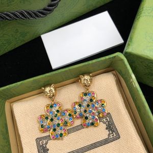 Brincos de grife pendentes multicoloridos brincos de charme para mulher brinco em forma de diamante de alta qualidade em latão fornecimento de joias da moda