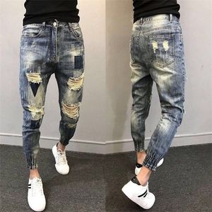 Wholesale Teenagers Social Spirit Guy Ripped Pants Trendy Tiepants Leg Feet Ankle Length Jeans Men's Slim Harem 220328