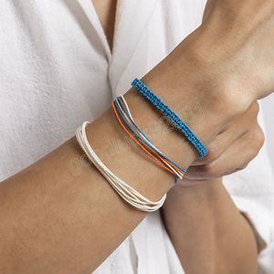 Set di braccialetti colorati in corda intrecciata fatti a mano da uomo con ciondoli alla moda, catene a strati, gioielli con bracciale in filo regolabile