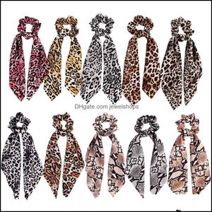 Leopard Bindet Sich. großhandel-24pc Leopard Print Scrunchie Damen Schal Elastische Band Bogen Gummi Seile Mädchen Haar Krawatten Zubehör Drop Lieferung Nackenmode VQXAR