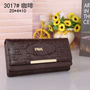 Popul￤ra designer Mens Womens Leather Clutch Pl￥nbokskorth￥llare Purses PAGS Damer Pr￤gling M￶nsterknapp Mens HASP Kreditkort Mynt Mynt Purse Handv￤skor Pl￥nb￶cker 3017