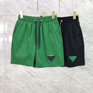 Traje de baño de los hombres de moda a estrenar triángulo verde estándar Swimtrunk Casual cinco minutos pantalones de playa pantalones cortos hombres verano pantalones deportivos finos