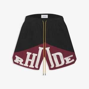 メンズサマーデザイナーRhude Beach Swirms Loose Shorts Womens Short Short Fashion Retro Letter Printed Drawstring Twocolorスプレッチロープトレンドカジュアルストリート