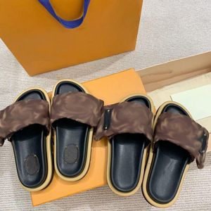 med låda Kvinnor män Sandaler Poolkudde Mules 2023 Designers Sunset Flat Comfort Mules Vadderad frontrem Tofflor Fashionabla