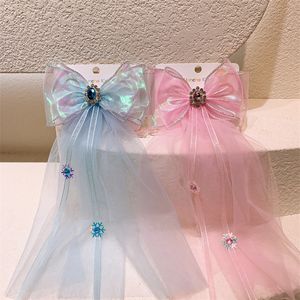 Barrettes per bambini coreani di nuova moda Copricapo Temperamento Ragazza dolce Principessa Lungo Streamer Arco Forcine Accessori per capelli