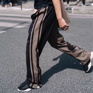 Gestreifte Kontrastfarbe gespleißt lose beiläufige Retro-Hosen Männer und Frauen seitlicher Reißverschluss Streetwear Harajuku Baggy Track Pants T200422