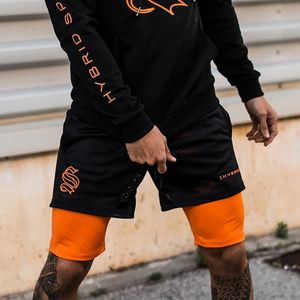 العلامة التجارية الأوروبية والأمريكية للأزياء الرياضية DoubleCker Shorts Men Traching Fake 2Piece Basketball Running Pants 220602