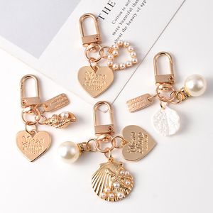 Kalp kabuğu kolye anahtarlık halkaları mini kadınlar kızlar moda zarif harf etiketi sevimli taklit inciler anahtar zincir hediyeler çanta asma cazibesi anahtarlık aksesuarları