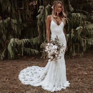 2023 Abiti da sposa a sirena araba di lusso Dubai Cristalli scintillanti Abiti da sposa senza schienale in pizzo lungo Corte dei treni Gonna in tulle robes de mariee