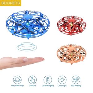 Wholesale ufo saucer resale online - Mini UFO Drone RC Helicopter Aircraft Toy Quadcopter Infrared Hand Sensing Interactive Flying Saucer RC Toys Golden Red Blue