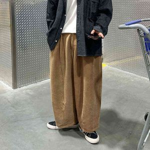 Jesienne Owwrotne spodnie Corduroy Men Modne retro swobodne streetwear luźne hiphop szerokie MXL J220629