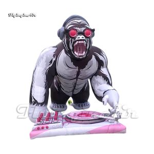 Concert Stage Decorative Inflatable Cartoon DJ Gorilla With Headphone Personalized Animal Mascot Model For Carnival Party Decoration