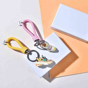 Mini Sneakers KeyChain Gift Box 3D Shoe Model Bag Backpack Ornaments Dekorationer Bil Keychain Surprise Smycken för flickvän AA220318