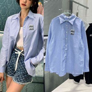 spring towel embroidered Embroidered Blue and white vertical stripes color matching medium long Lapel shirt loose