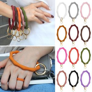 Chaves -chave Big Ochau de Silicone Loop Key Keychain com Gold Flop Round Strap Acessórios por atacado Mulheres de bolsa