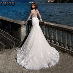 2022 Boho Mermaid Wedding Dresses Sexy Backless Lace Applique Tulle Straps V Neck Covered Buttons Back Beach Wedding Gown Vestidos de novia