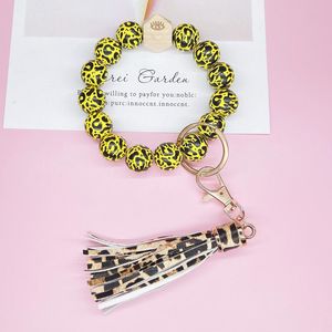 2022 Träpärlarmband Party Favor Leopard Print Keychain Handgjorda läder Tassel armband Pendant Fashion Wristlet Bandles Holder Arv Ring Smycken