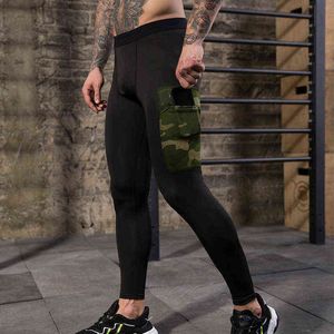 Män gym Leggings New Side Pocket Joggers Tight Pants Sportwear Quick Dry Breattable Pro Compression Fitness Trousers G220713