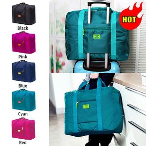 Duffelpåsar Portable Travel Folding unisex stor kapacitet Kvinnor Handbagage affärsresa Vattentätduffel